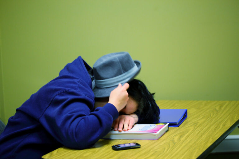Teens sleeping in class