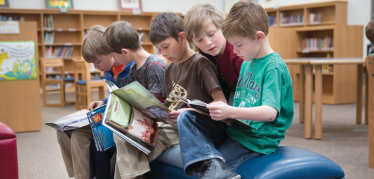 Students read in the library at Sage Canyon Elementary School in Castle Rock, Colorado.