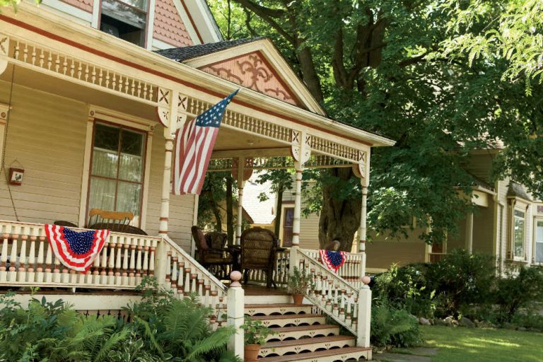 A southern porch with an American flag