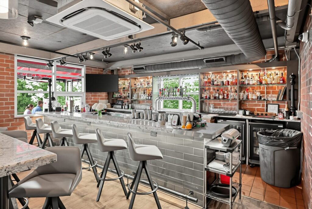 The bar at The Pump House, an upscale, multi-level restaurant and rooftop bar located directly on the Catawba River