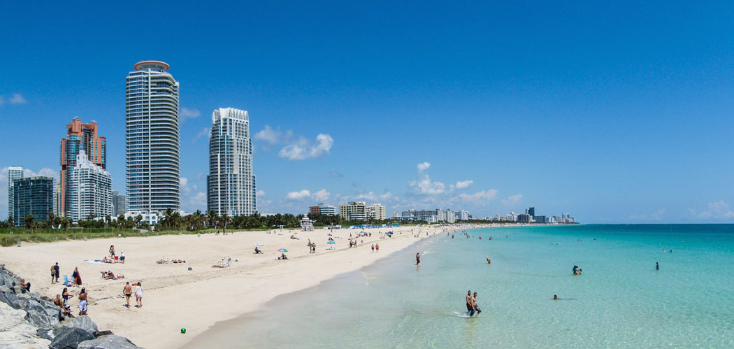 Visitors and residents enjoy the beaches of Miami, Florida.