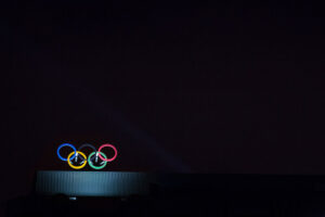 Olympic rings against a black backdrop