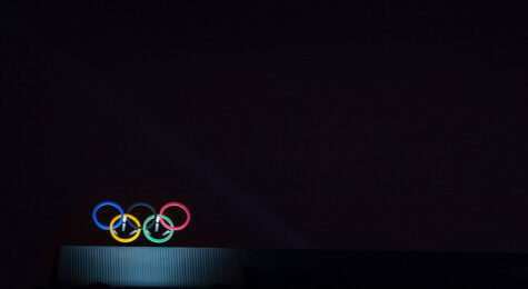 Olympic rings against a black backdrop