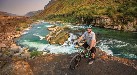 Andrew Perttula, owner of Pertt’s Bike Rental in Twin Falls, enjoys a ride at Auger Falls