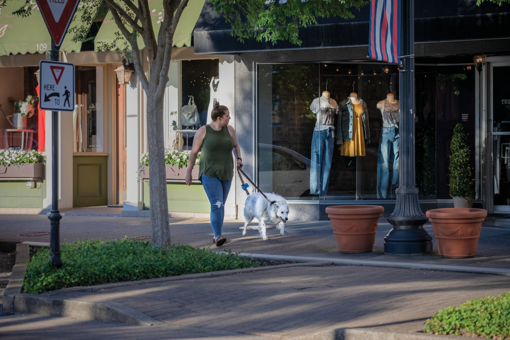 Visitors walk past shops along North Church Street in downtown Murfreesboro, Tennessee.