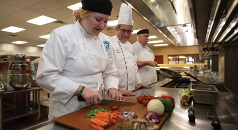 Abigail Killian prepares food in the kitchen at the Mori Hosseini College of Hospitality and Culinary Management on the Daytona State College campus in the Greater Daytona Region. ©Journal Communications/Nathan Lambrecht