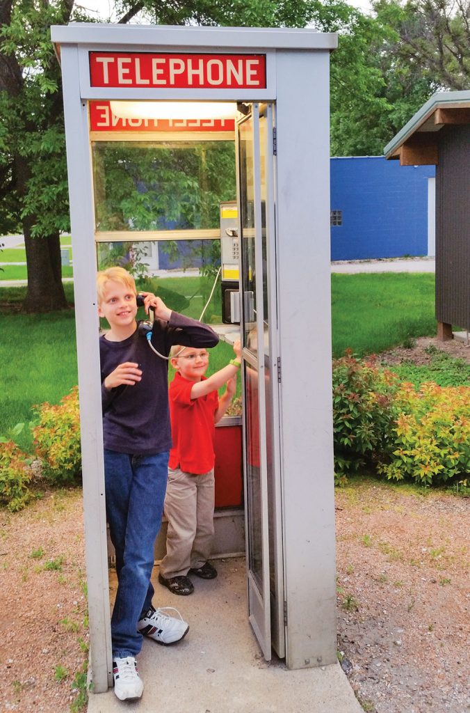 This working phone booth in Kelley, IA, has its own Facebook page.
