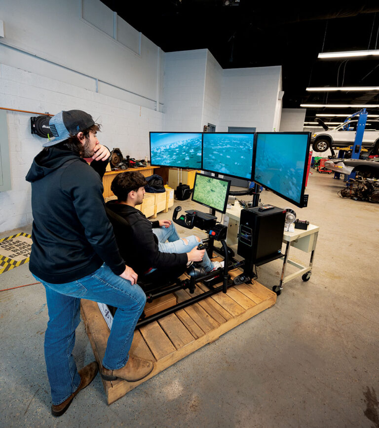 Oak Ridge High School students test out flight simulators, which were awarded to them as part of a Carl Perkins Reserve Grant.