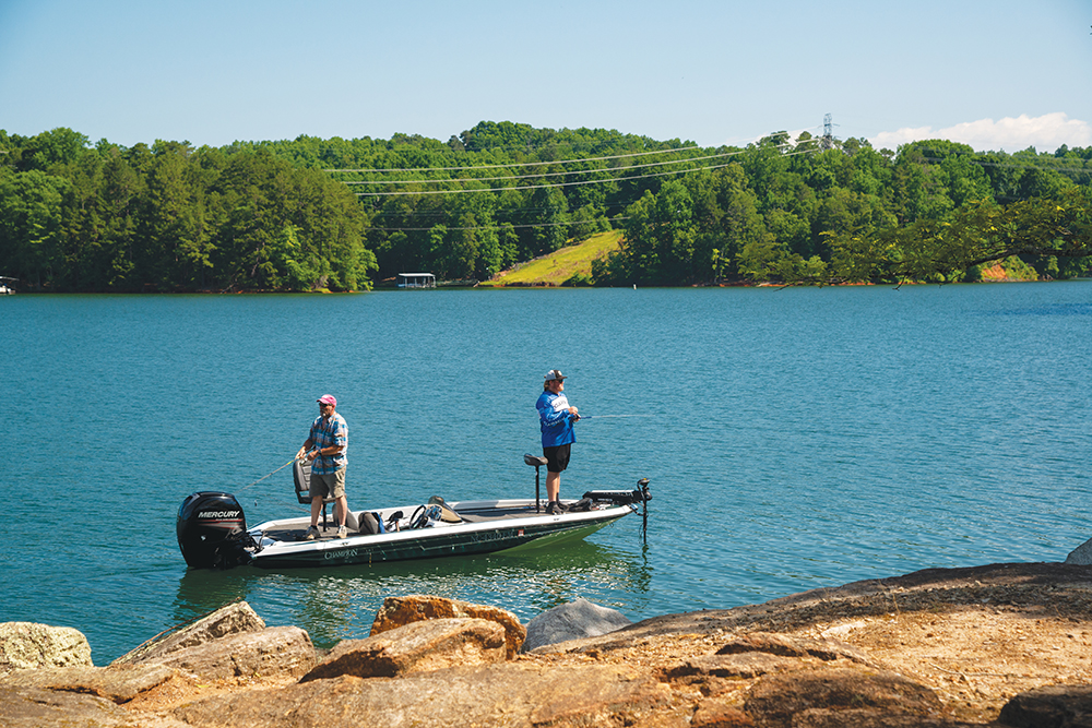 People fishing off of a boat at Twelve Mile Recreation Area/Mountain View Park in South Carolina.
