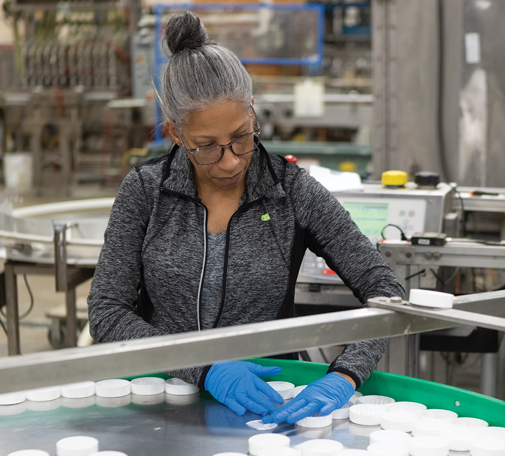 Employees sort product in the production area at Clean Control in Warner Robins, Georgia, which is part of the Robins Region.