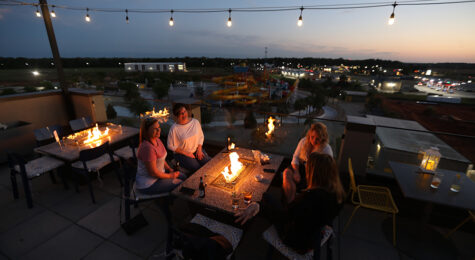 Visitors enjoy the sunset at Gracie's Rooftop Bar at the Rigby's Entertainment Complex in Warner Robins, Georgia. ©Journal Communications/Jeff Adkins