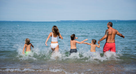 Family at the beach in Traverse City, MI