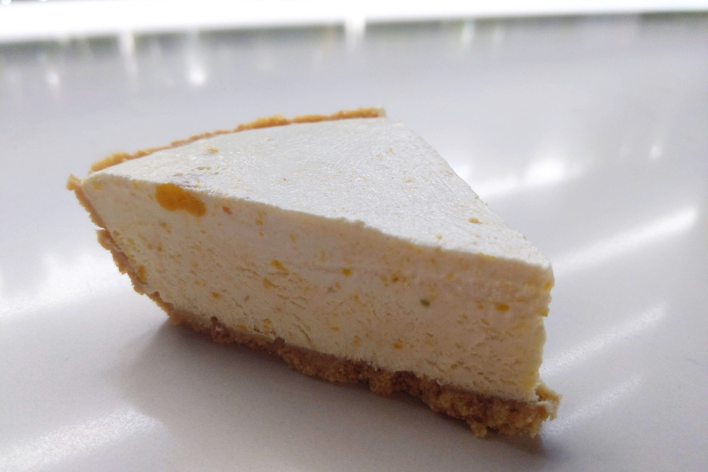 Photo of a slice of kumquat pie, which is a Florida dessert and is a delicacy from Kumquat Growers.