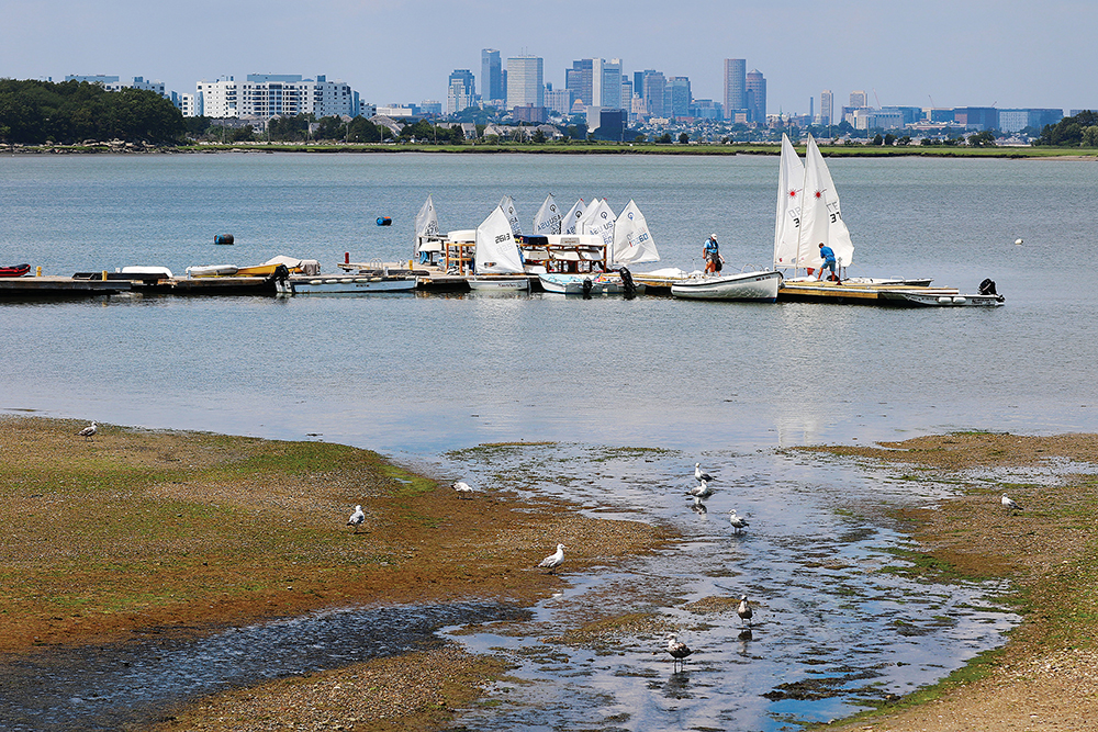Sailboats along the water at Wollaston Beach in Quincy, Massachusetts.