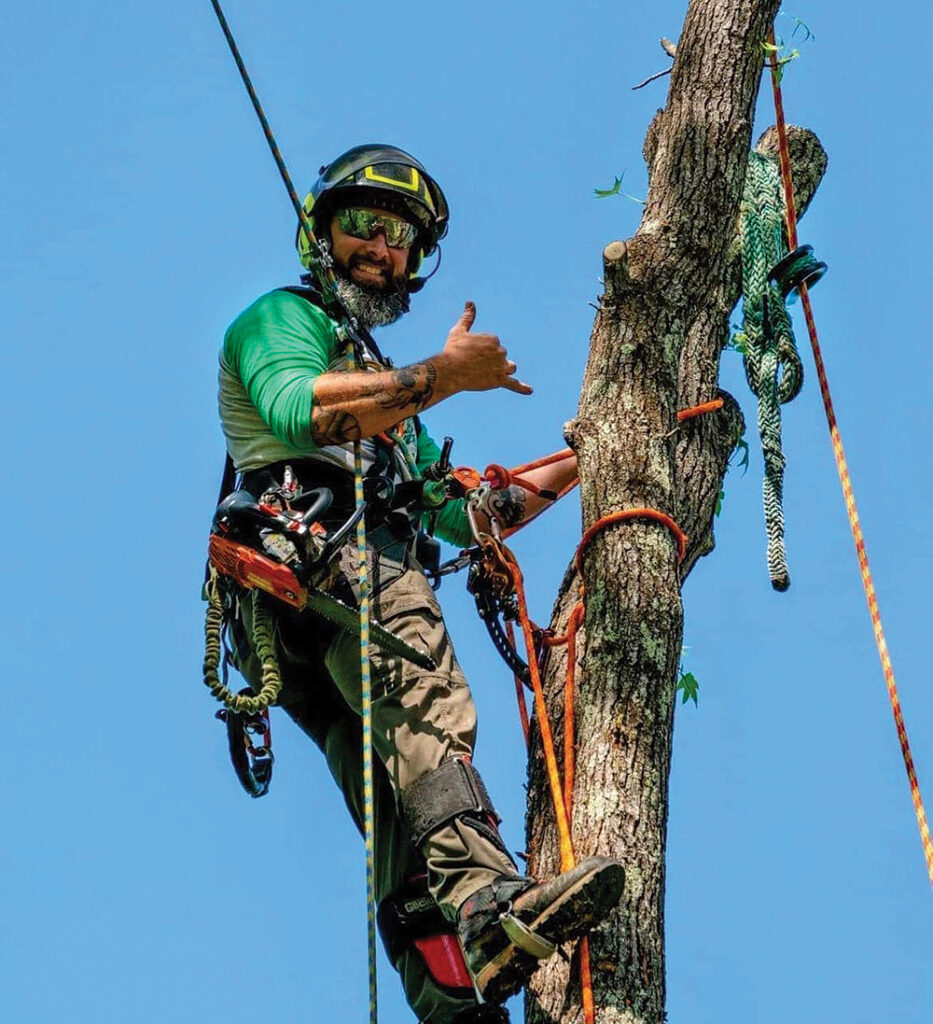 Man experiencing adventure at Yankee Belle Tree Works in the Robins Region area of Georgia.