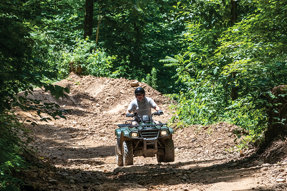 ATV riders on the Bearwallow section of the The Hatfield-McCoy Trails near Logan. Logan is located in the Advantage Valley region of West Virginia.