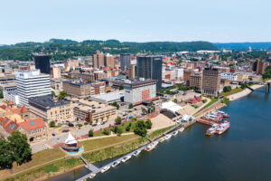 The Kanawha River flows along downtown Charleston. Charleston is located in the Advantage Valley region of West Virginia.