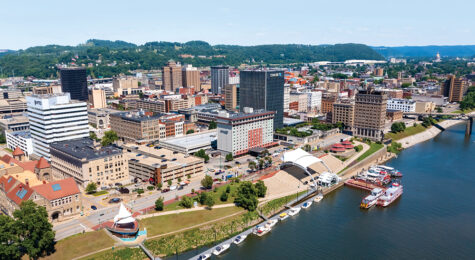 The Kanawha River flows along downtown Charleston. Charleston is located in the Advantage Valley region of West Virginia.