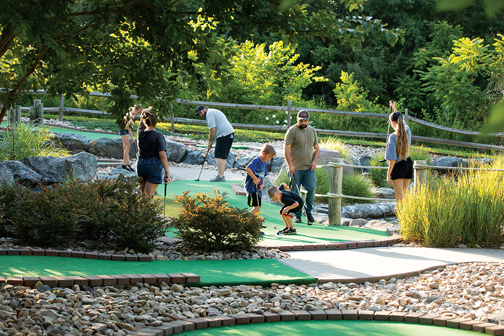 Patrons play mini golf at The Boardwalk at Lake Anna in Louisa county, Virginia. Louisa County is located in Central Virginia.