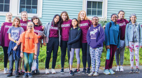 Students stand outisde of The Woodward School in Quincy, MA.