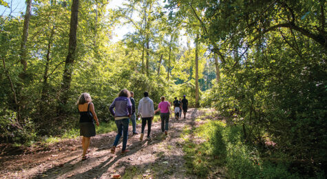 Residents walking on the Fifeville Trail in Charlottesville, which is located in Central Virginia.