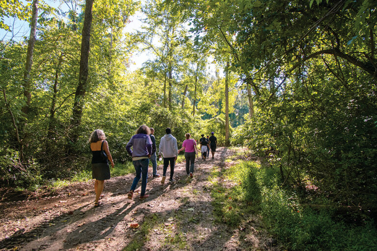 Residents walking on the Fifeville Trail in Charlottesville, which is located in Central Virginia.