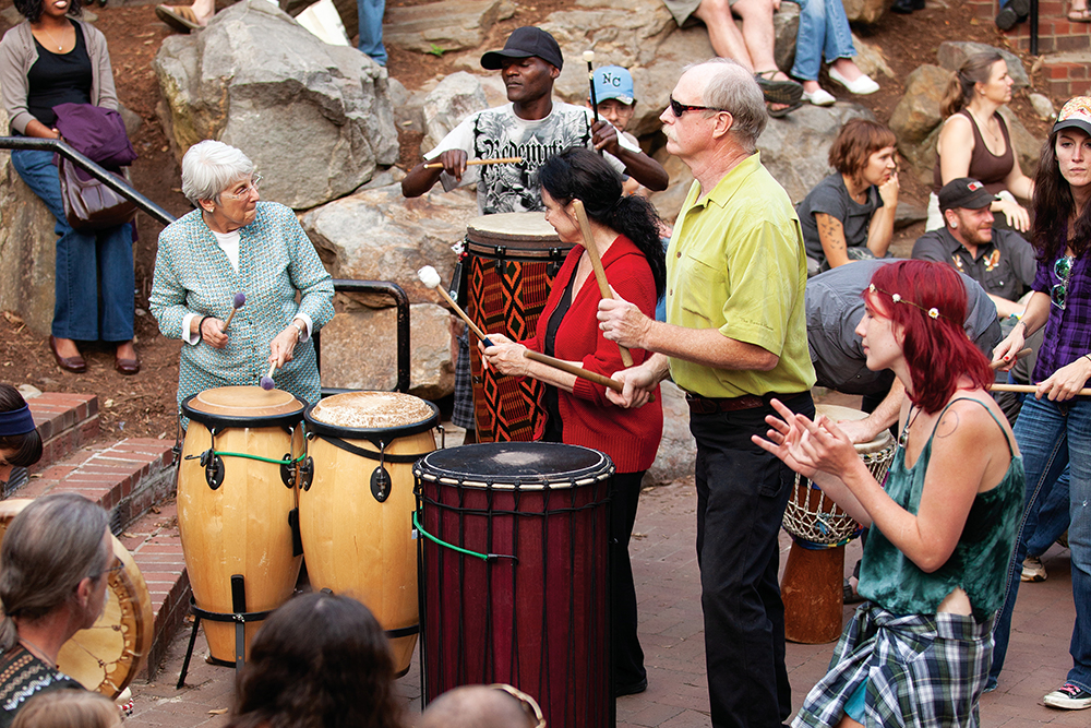 Friday night drum circle at Pritchard Park in downtown Asheville, NC.