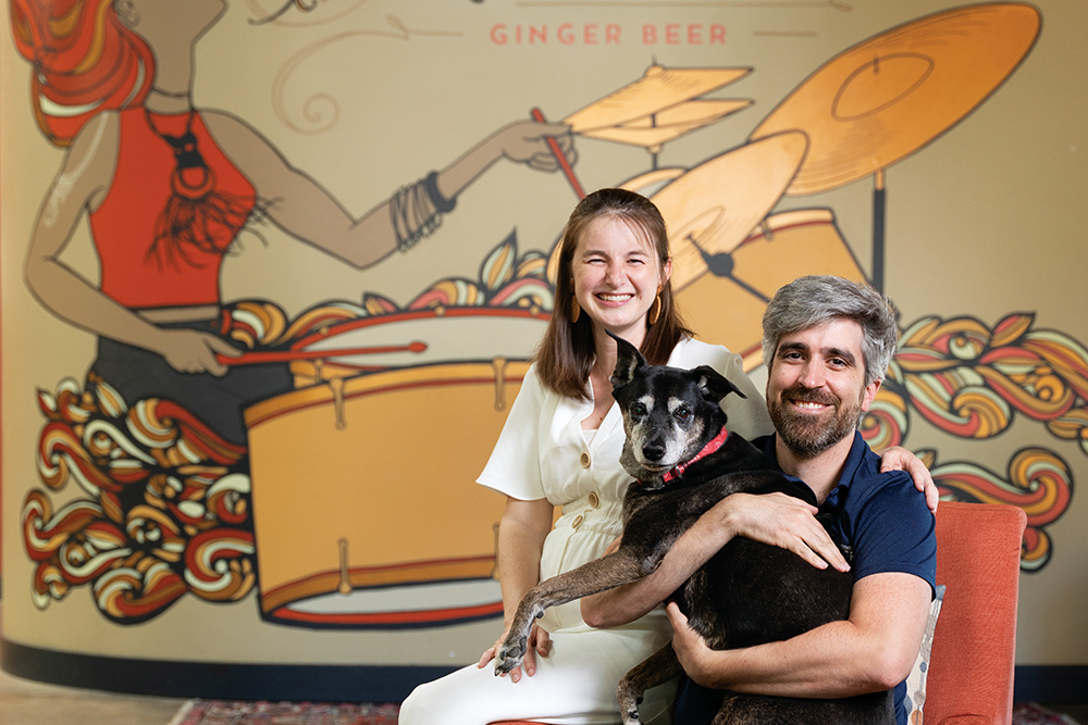 Cristina Hall Ackley and David Ackley, owners of Ginger's Revenge with their dog Pakora.