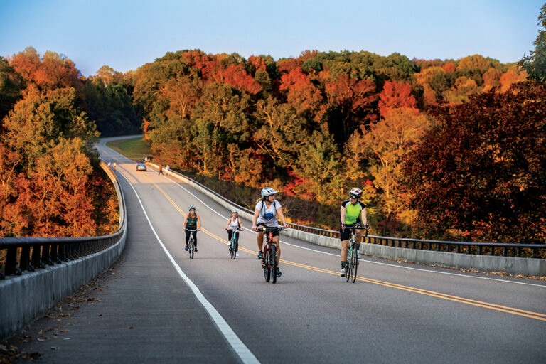 Cyclists ride over the Natchez Trace Parkway Bridge along the Natchez Trace Parkway in Williamson County, Tennessee, which is just outside of Nashville.