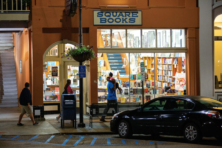 Exterior shot of Square Books at nighttime. Square Books is a beloved bookstore in Oxford, MS.
