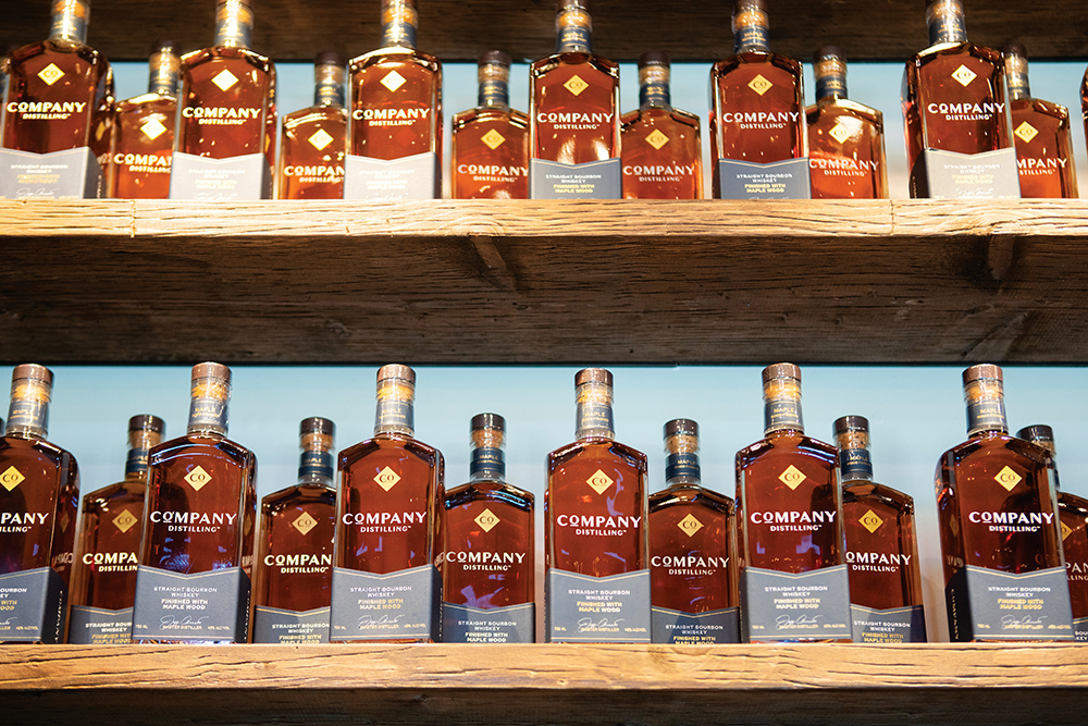 Bottles of bourbon are stacked on shelves at Company Distilling in Townsend, Tennessee, which is in Blount County.