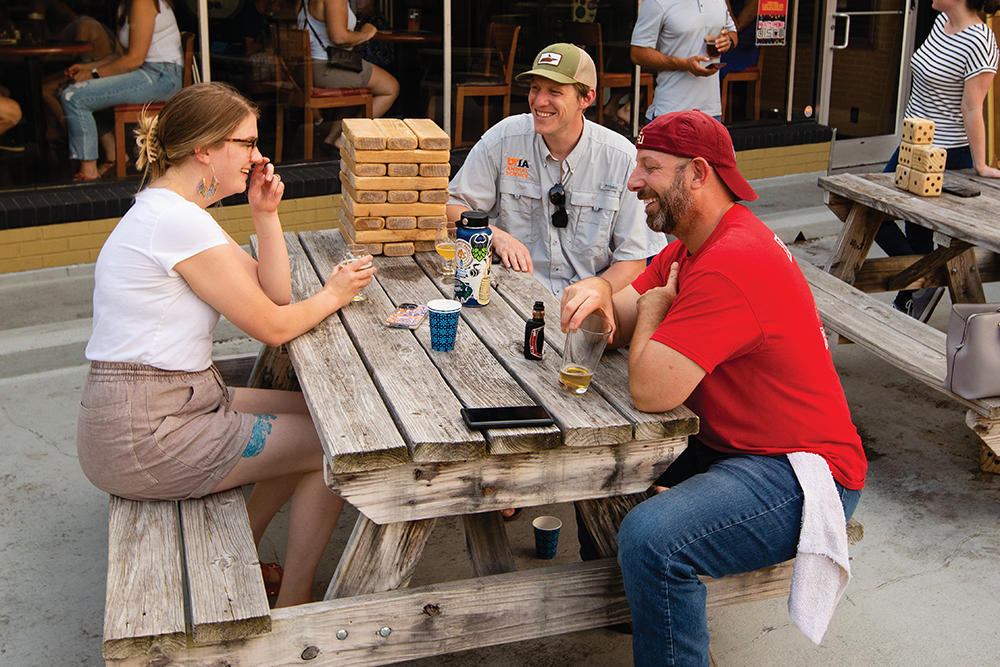 Visitors enjoy food and beer at Tri-Hop Brewery in downtown Maryville, Tennessee, which is in Blount County.