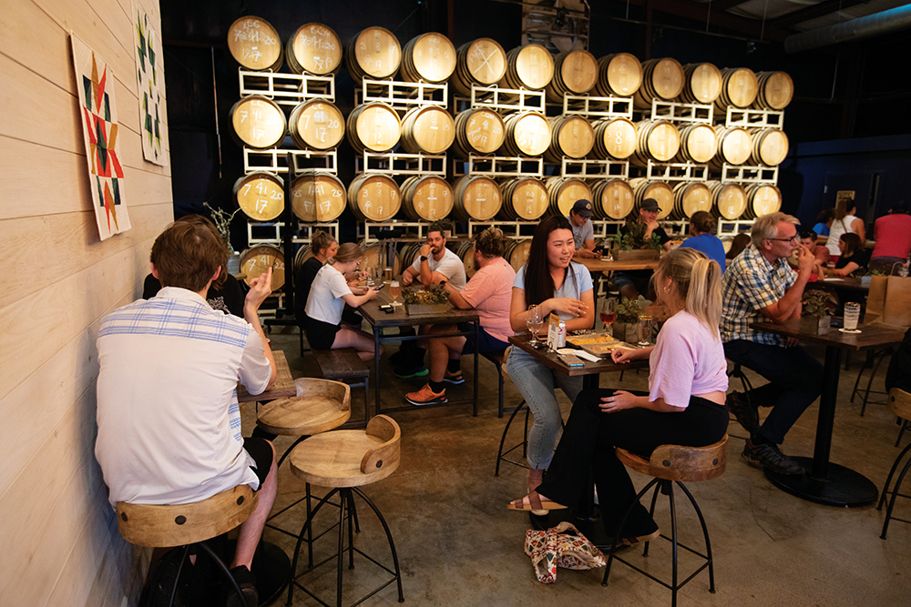 Visitors enjoy beer and food in the tap room at Blount County's Blackberry Farm Brewery in Maryville, Tennessee.