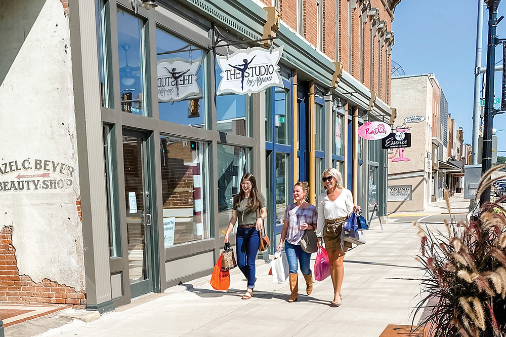 A group of women enjoy the downtown shopping area of Waterloo, which is located in the Cedar Valley region of Iowa.
