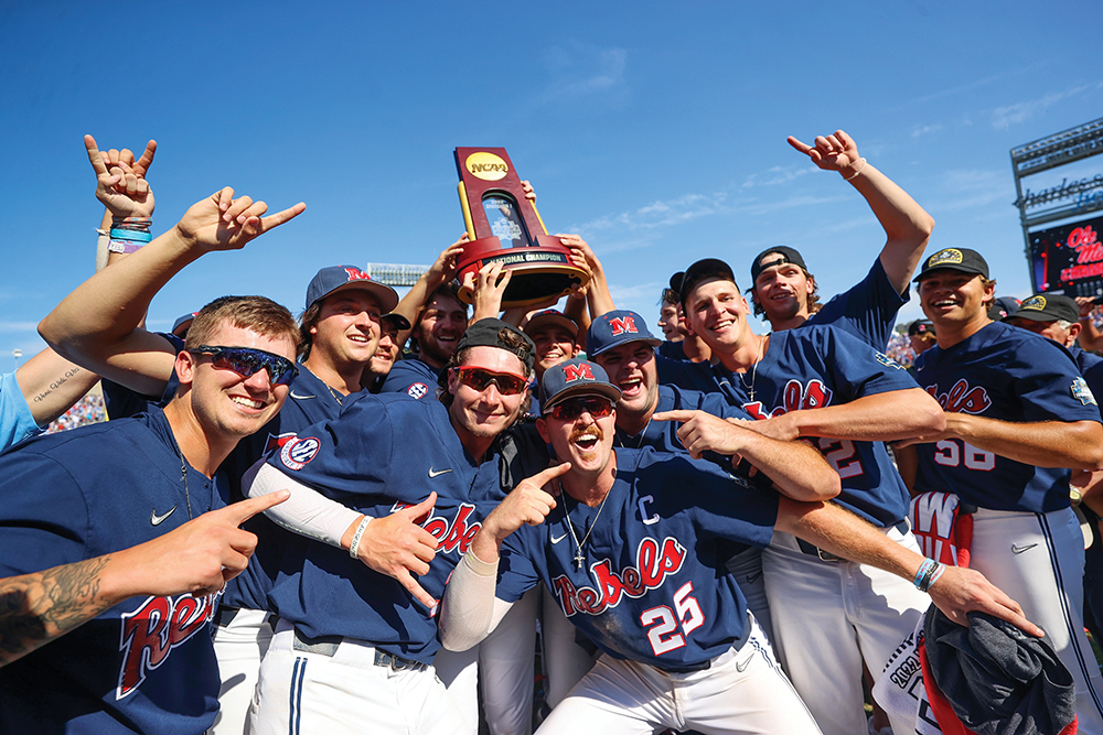 Ole Miss baseball players celebrate their 2022 College World Series championship. Ole Miss is the flagship university for Oxford, MS.