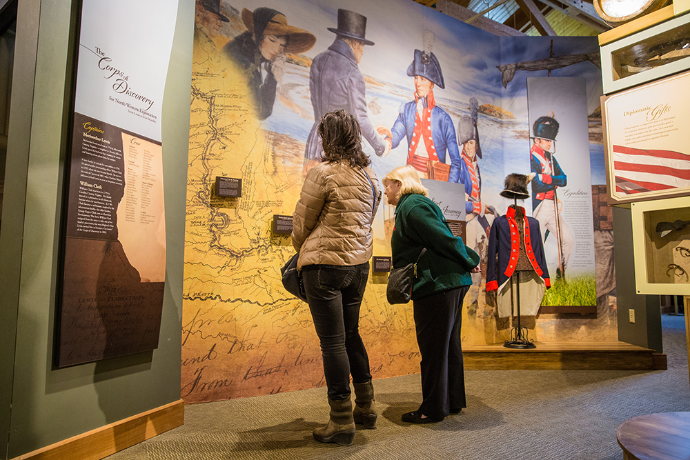 Listening to the story of the Corps of Discovery at the Lewis and Clark Interpretive Center. Credit North Dakota Tourism