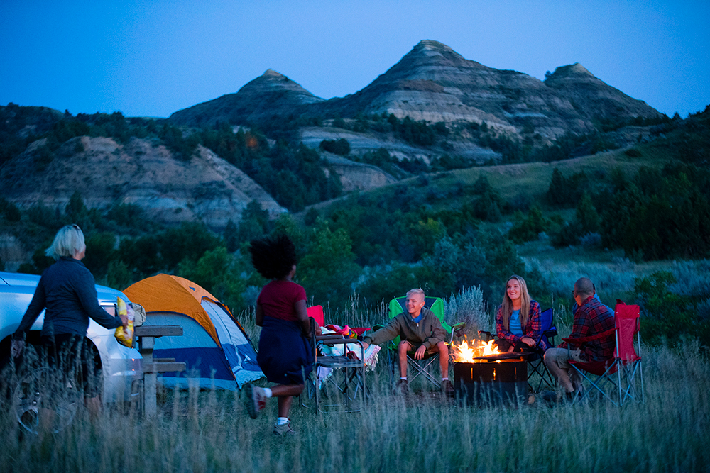 Family camping at the CCC Campground. The campground has trailheads for the Maah Daah Hey Trail and Long X Trail. Part of the 2020 North Dakota Tourism Ad Campaign