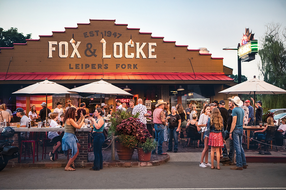 People gather outside Fox and Locke in Leipers Fork, which is in Williamson County.