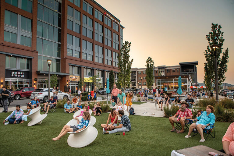 People enjoy an evening on the lawn at McEwen Northside in Franklin. Franklin is located in Williamson County.