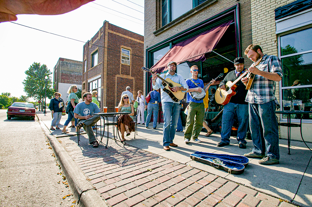 People enjoy street musicians in Grand Forks, ND. 