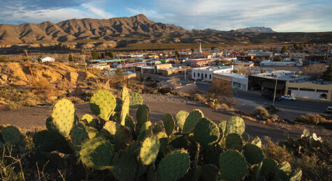 The setting sun lights up the cactuses and the Caballo Mountains surrounding Truth or Consequences, New Mexico.