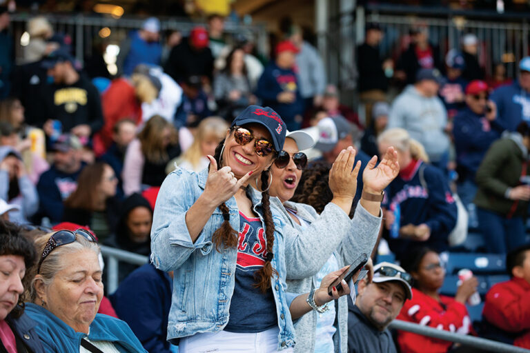 Eduarda Santos cheers on the Worcester Red Sox during a game at Polar Park in Worcester, MA.