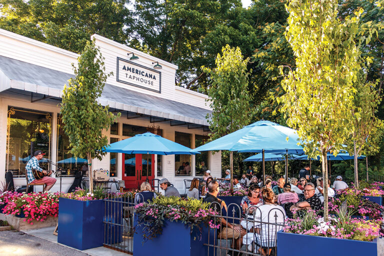 People sit on the patio at Americana Tap House in Franklin. Franklin is located in Williamson County, TN.