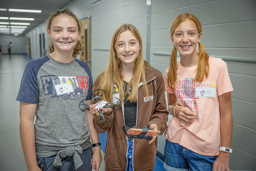 Girls stand with their inventions at Girls Tech Camp, which is put on by the Williamson County Schools system and is located in Williamson County, TN.