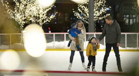 Family on a skating rink. North Dakota is a great place to raise a family.
