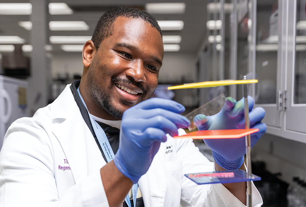 WFIRM, Winston Salem NC, demo of the body-on-a-chip system/microfluidic system, Khiry Sutton Murphy, post doc lab employee / research fellow.
