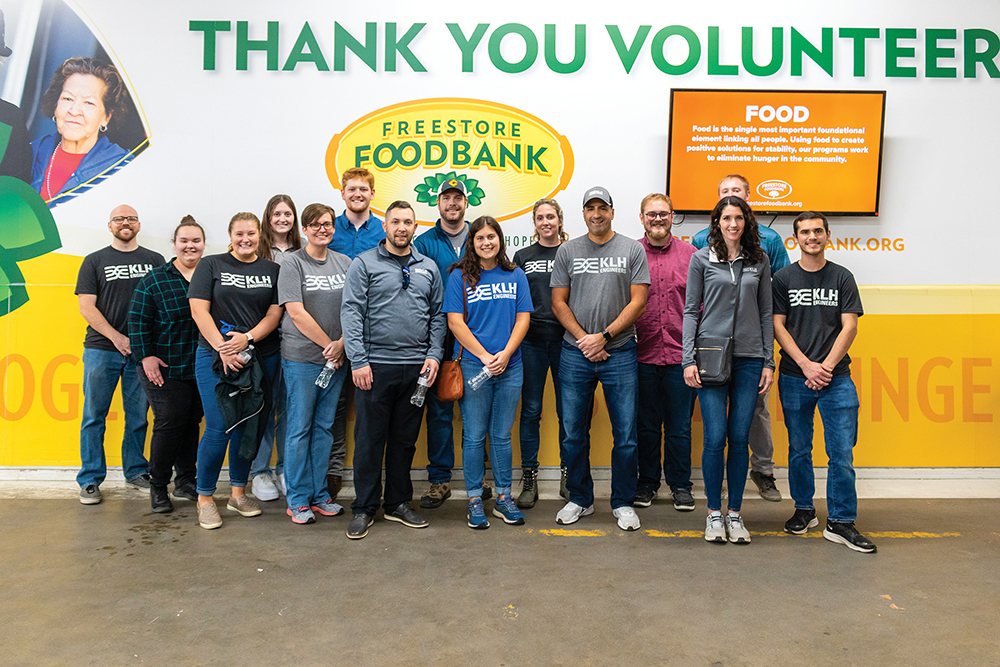 Volunteers from KLK Engineers work at the Freestore Foodbank in the Northern Kentucky region.