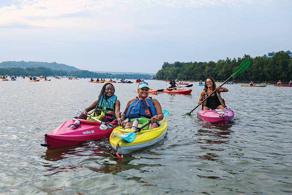 People participating in The Ohio River Paddlefest in Northern Kentucky.