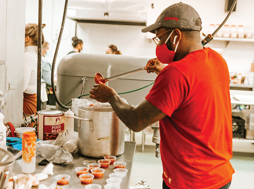 Man works at the Incubator Kitchen Collective in Northern Kentucky.