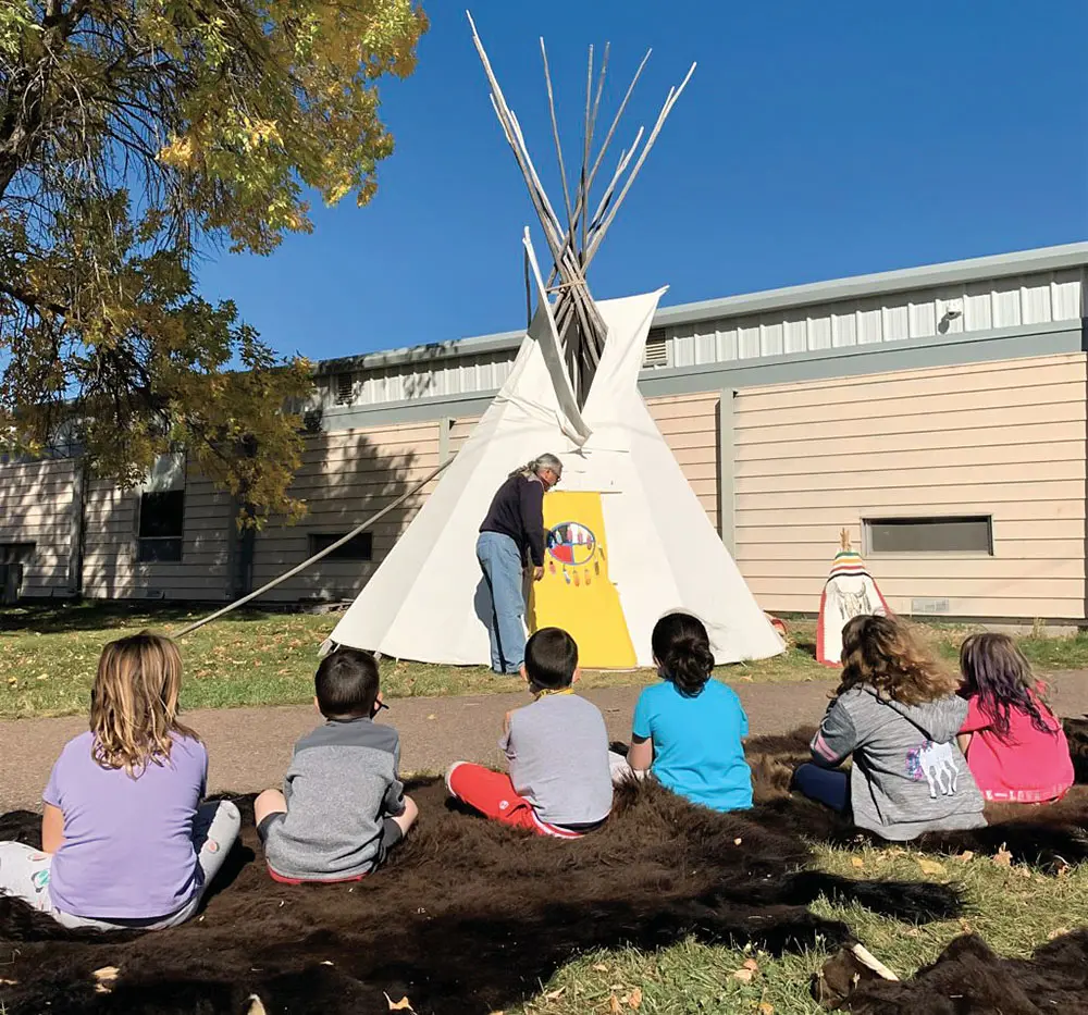 Dugan Coburn, director of Indigenous Education at GFPS, works with students.